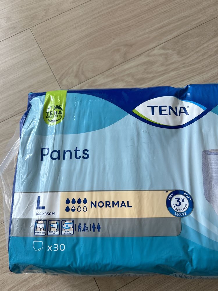 Памперси TENA Pants розмір L  100-135 cм.