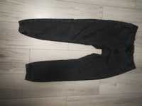 Spodnie czarne jeansy z sinsay