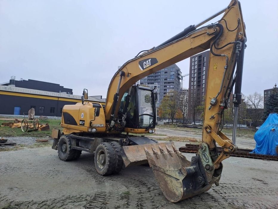 Колісний екскаватор CAT 315 Atlas