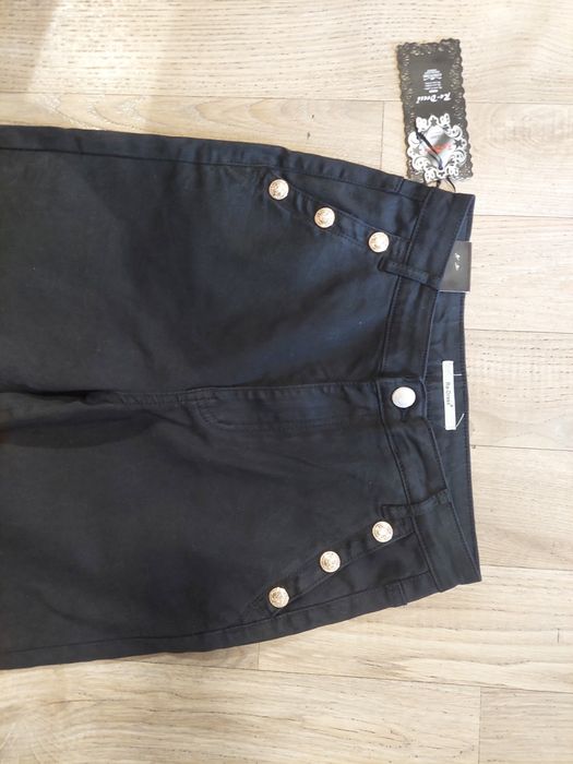 Nowe spodnie czarne jeansy z guzikami M 38