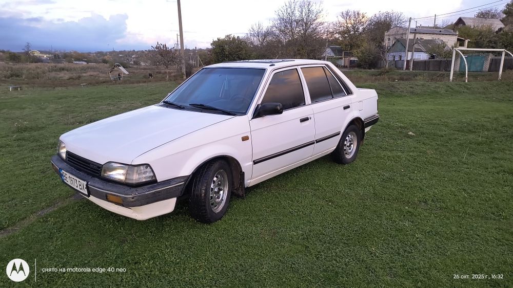 Продам Мазду 323.