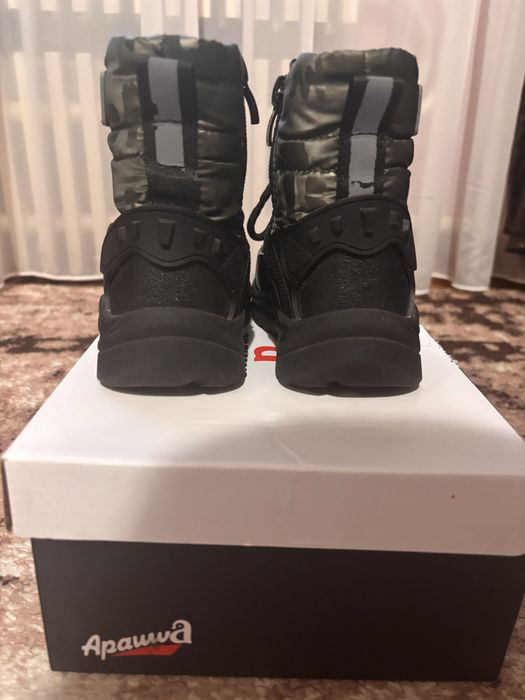 Продам зимние ботинки