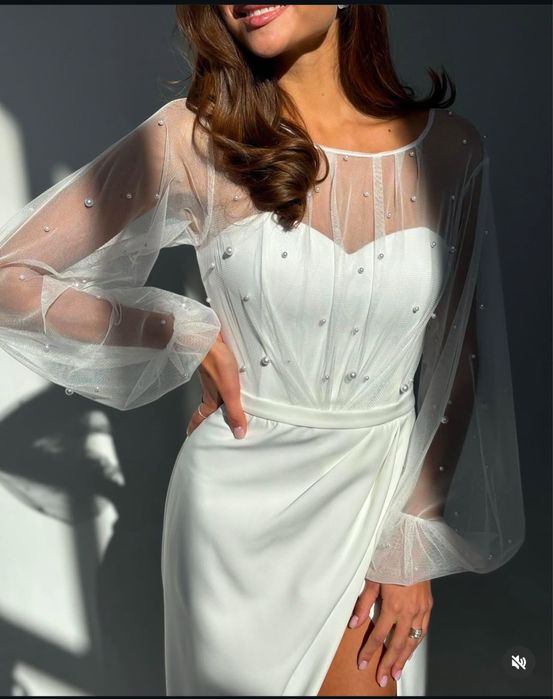 Весільна сукня з гарною спинкою