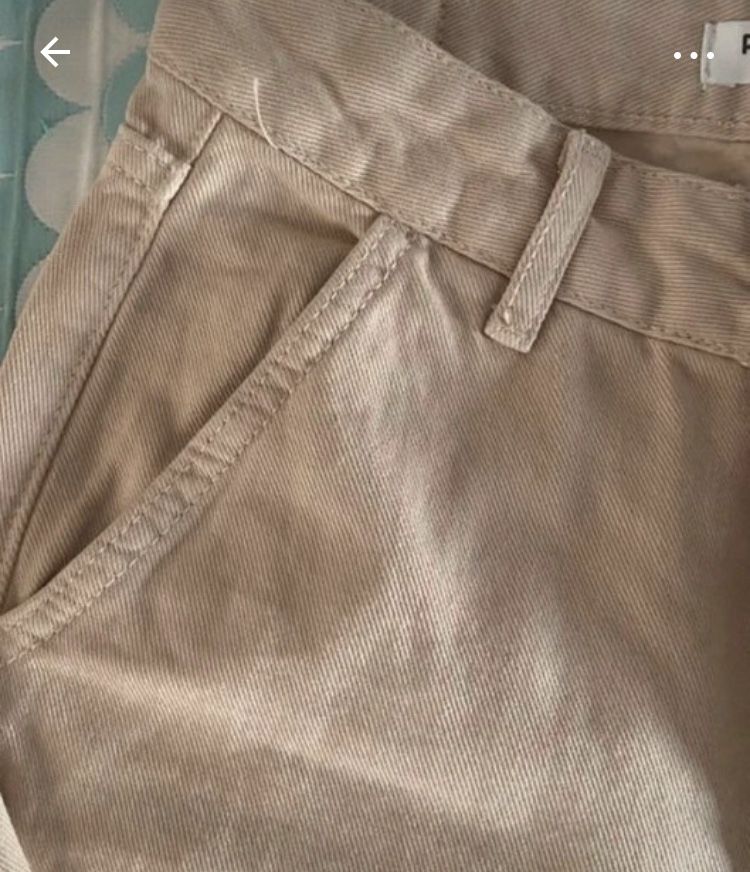 Calças bege com bolsos laterais da Pull
