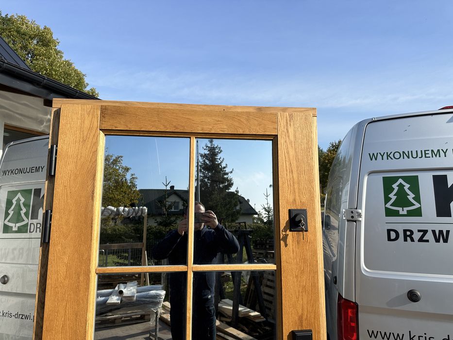 Drzwi zewnętrzne drewniane z klamką Schlage na wymiar Czyste powietrze