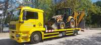 Transport maszyn traktory kombajny koparki bobcaty wózki pomoc drogowa