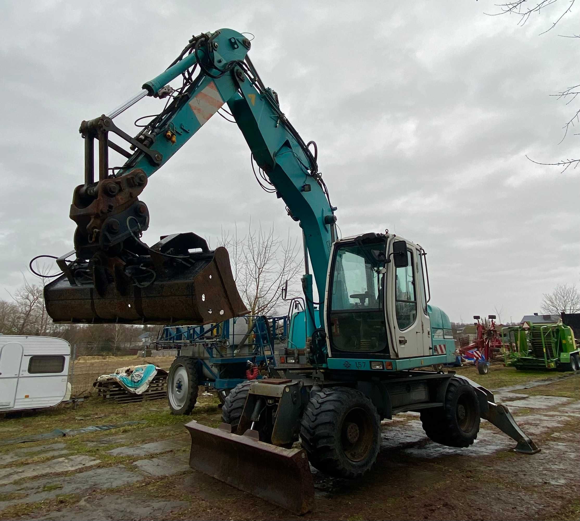 Koparka kołowa Liebherr A 314 LITRONIC 4x4 + łyżki