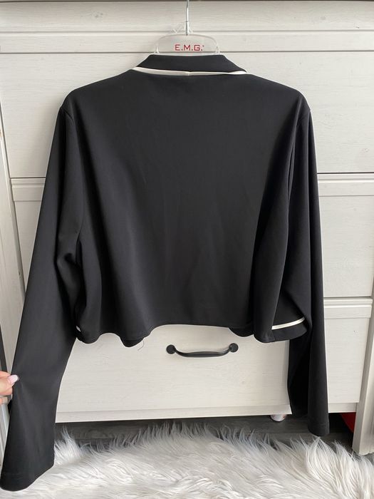 Joanna Hope czarne bolerko z kontastrową lamówką