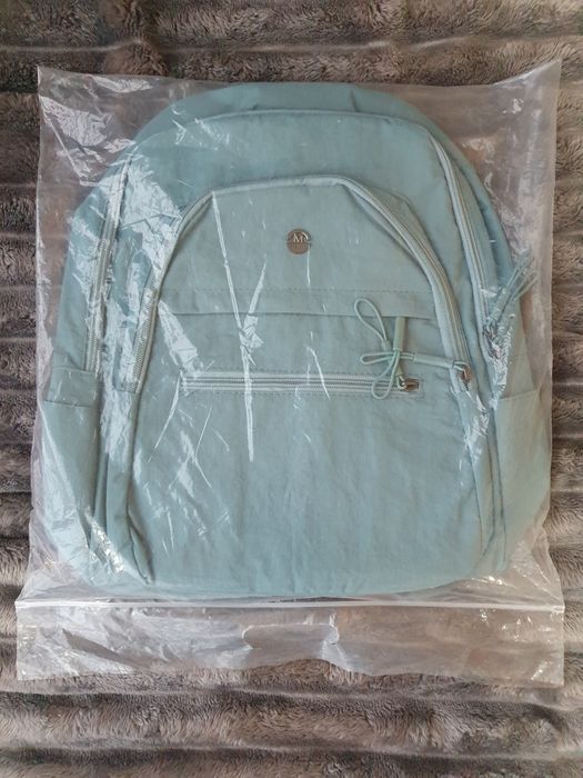 Mochila azul claro impermeável NOVA – ideal para viagem ou dia-a-dia