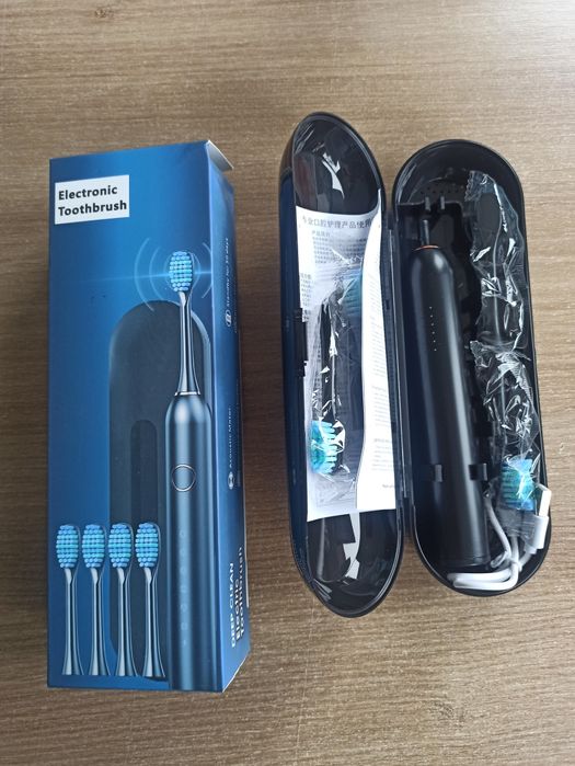 Szczoteczka Soniczna elektryczna plus 4 końcówki