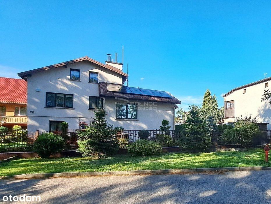 Komfortowy dom z pięknym ogrodem