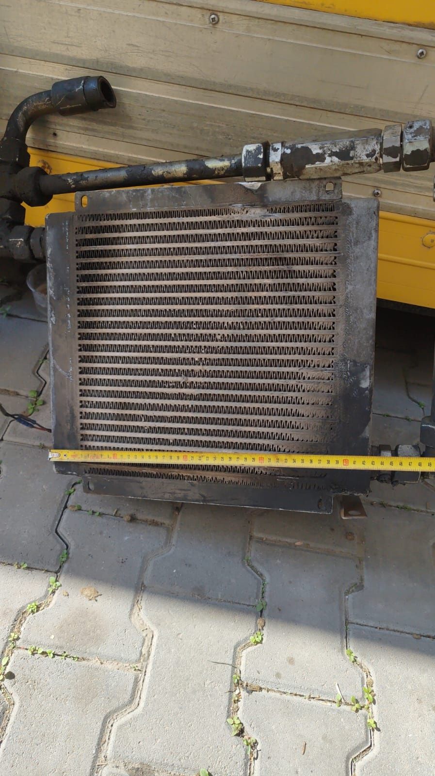 Радіатор гідравлічний. Кран маніпулятор. Palfinger Hiab Fassi JCB