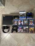 PS4 1 Tera 2 comandos 7jogos físicos