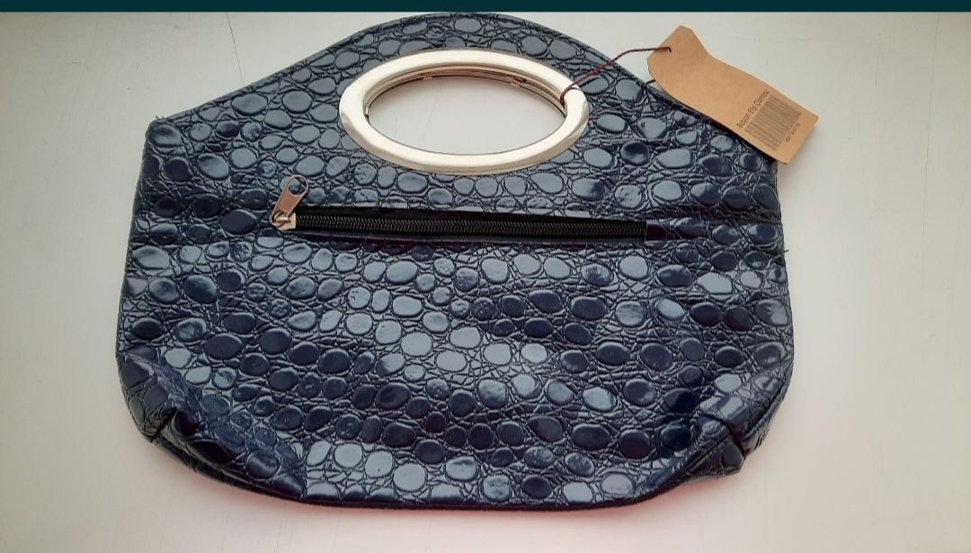 Нова шкіряна сумочка - клатч ,куплена в Турції .
Відправка новою чи ук
