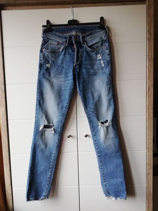 Jeansy z rozdarciami S