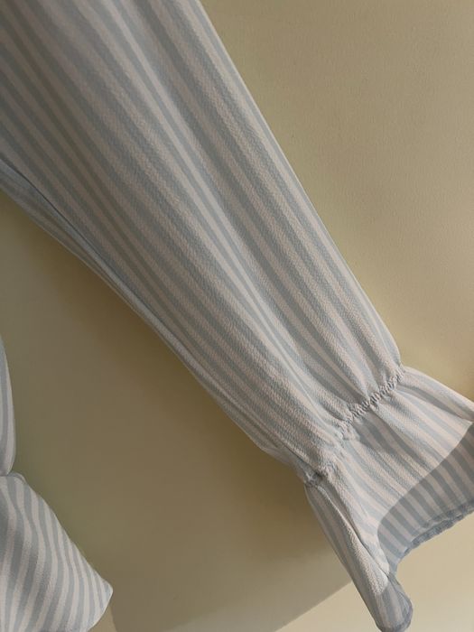 Blusa com folho de manga comprida