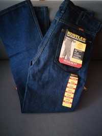 Męskie, nowe, granatowe spodnie jeansowe.