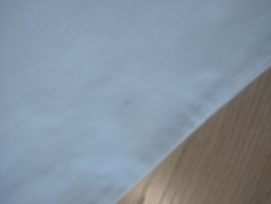 Białe dżinsy z dziurami na kolanach, rozmiar L