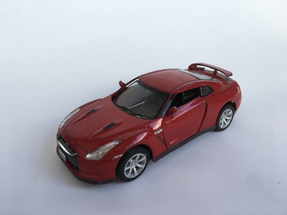 детская игрушка моделька машина машинка вишневая Kinsmart Nissan 2009