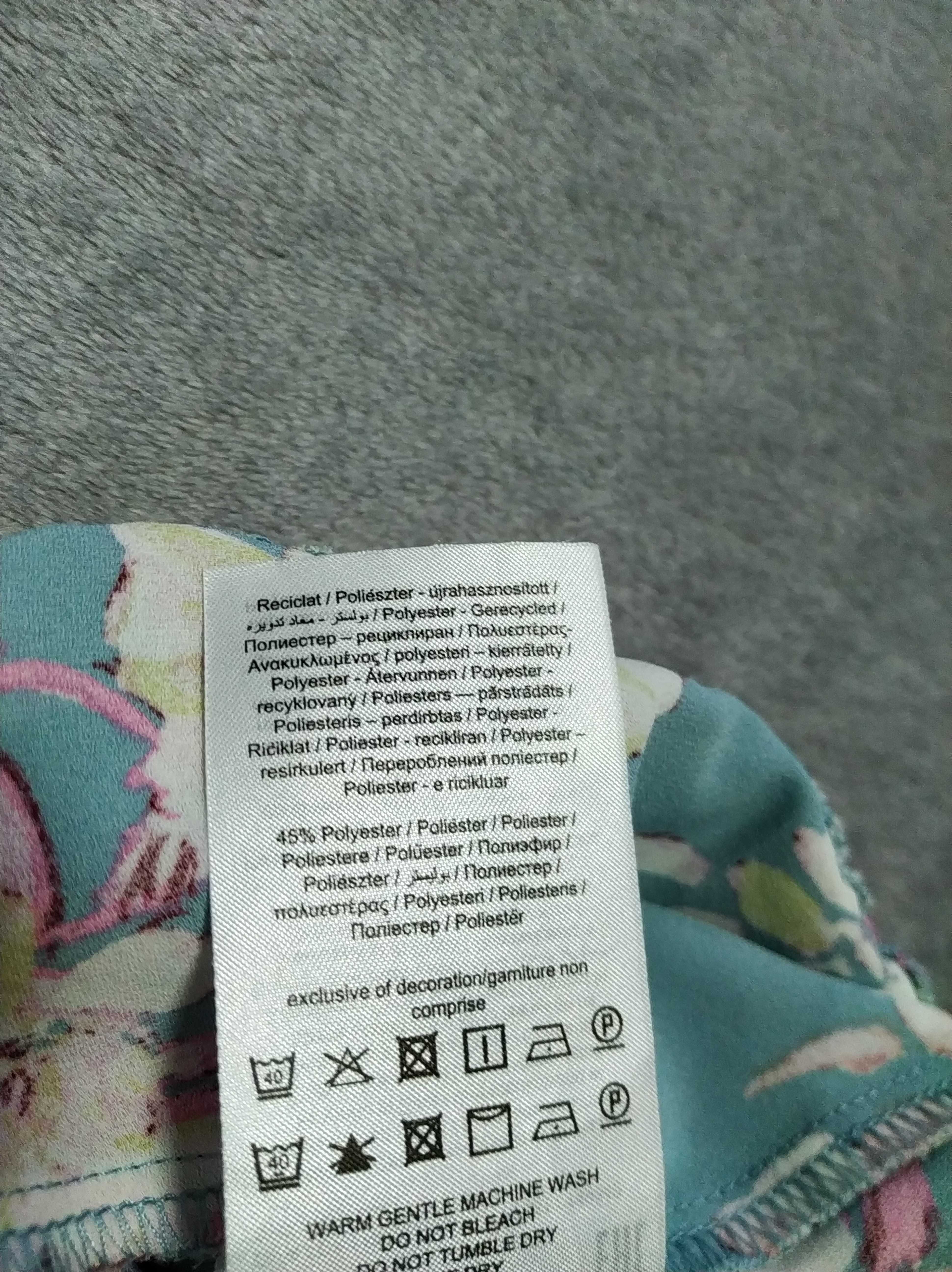Брендова,стильна спідниця з розрізом в квітковий принт 44-46 р-ONLY