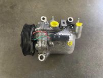 Компресор кондиціонера Peugeot 301 Citroen C-Elysee 9806599380