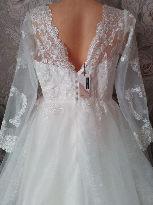 Нове весільне плаття 50-52  розміру з етикеткою