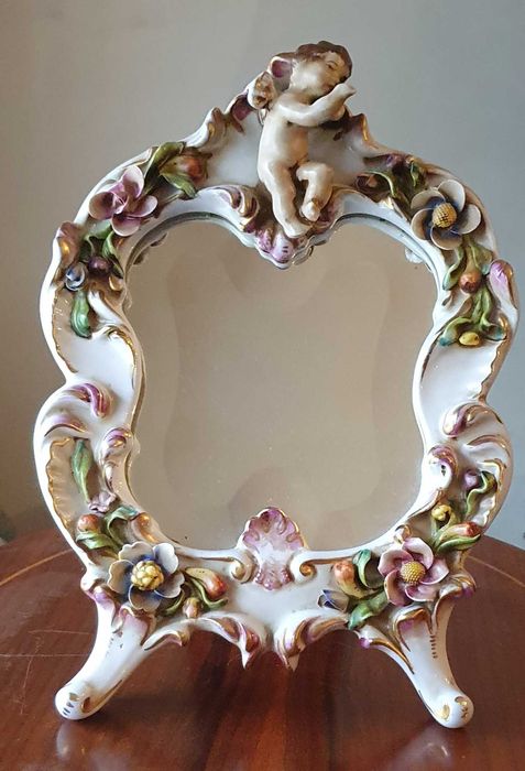 Espelho magnífico em porcelana de Sèvres.