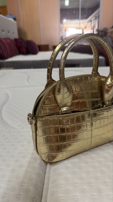 Mala da zara, dourada