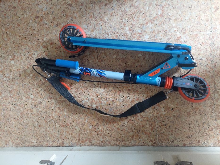 Trotinete  com travao oxelo