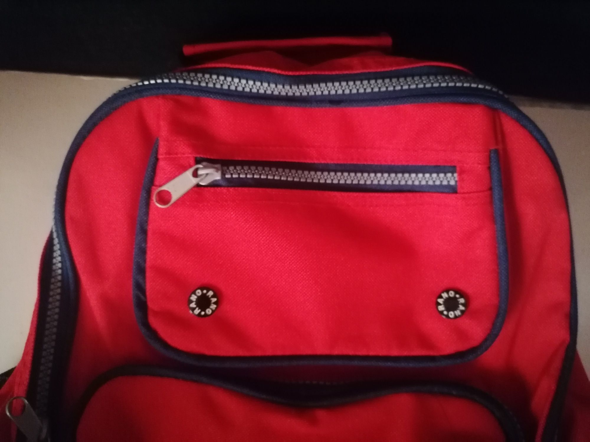 Mochila trolley com publicidade da Coca-Cola
