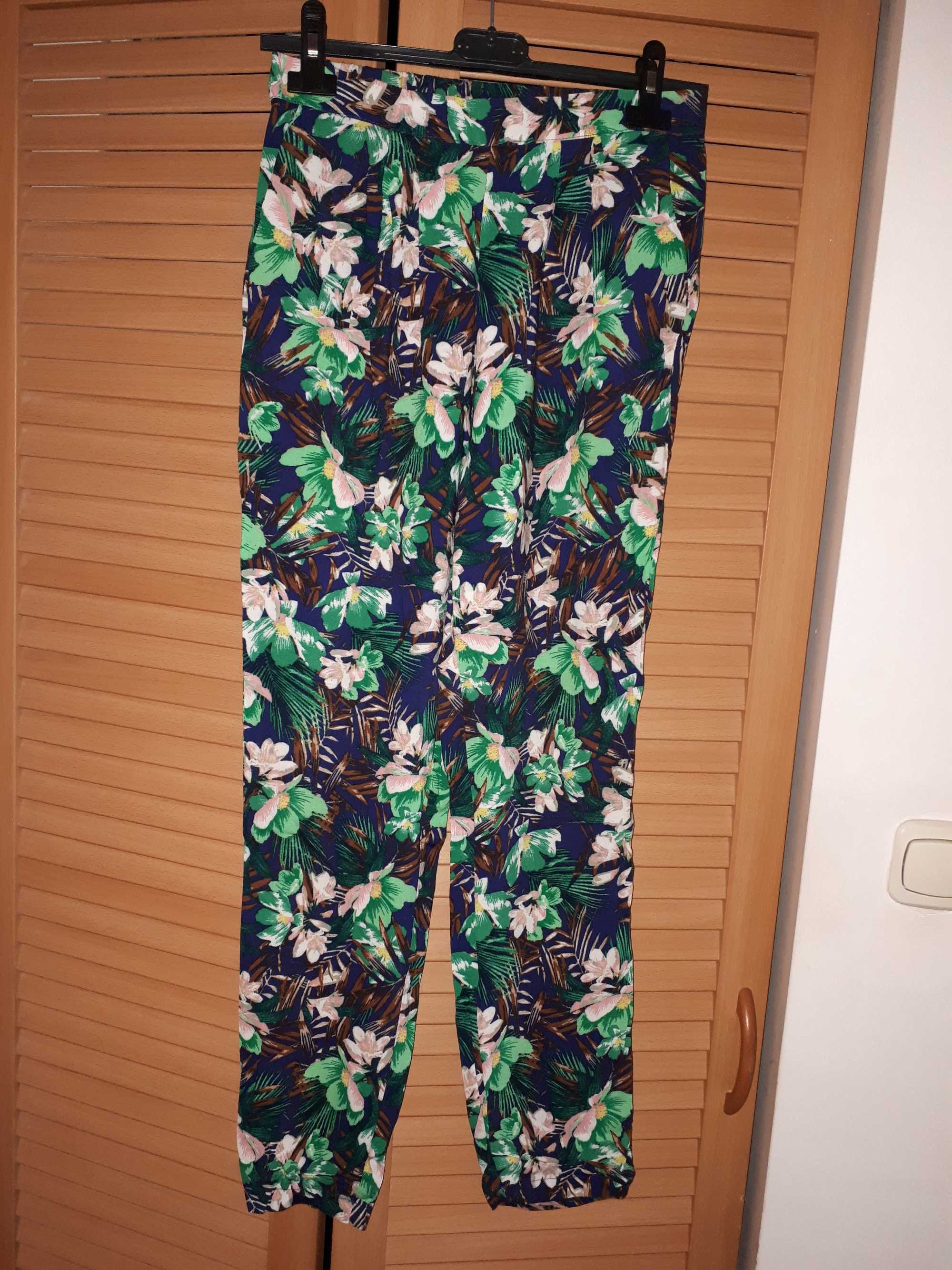 Letnie spodnie w kwiaty H&M, stan idealny
