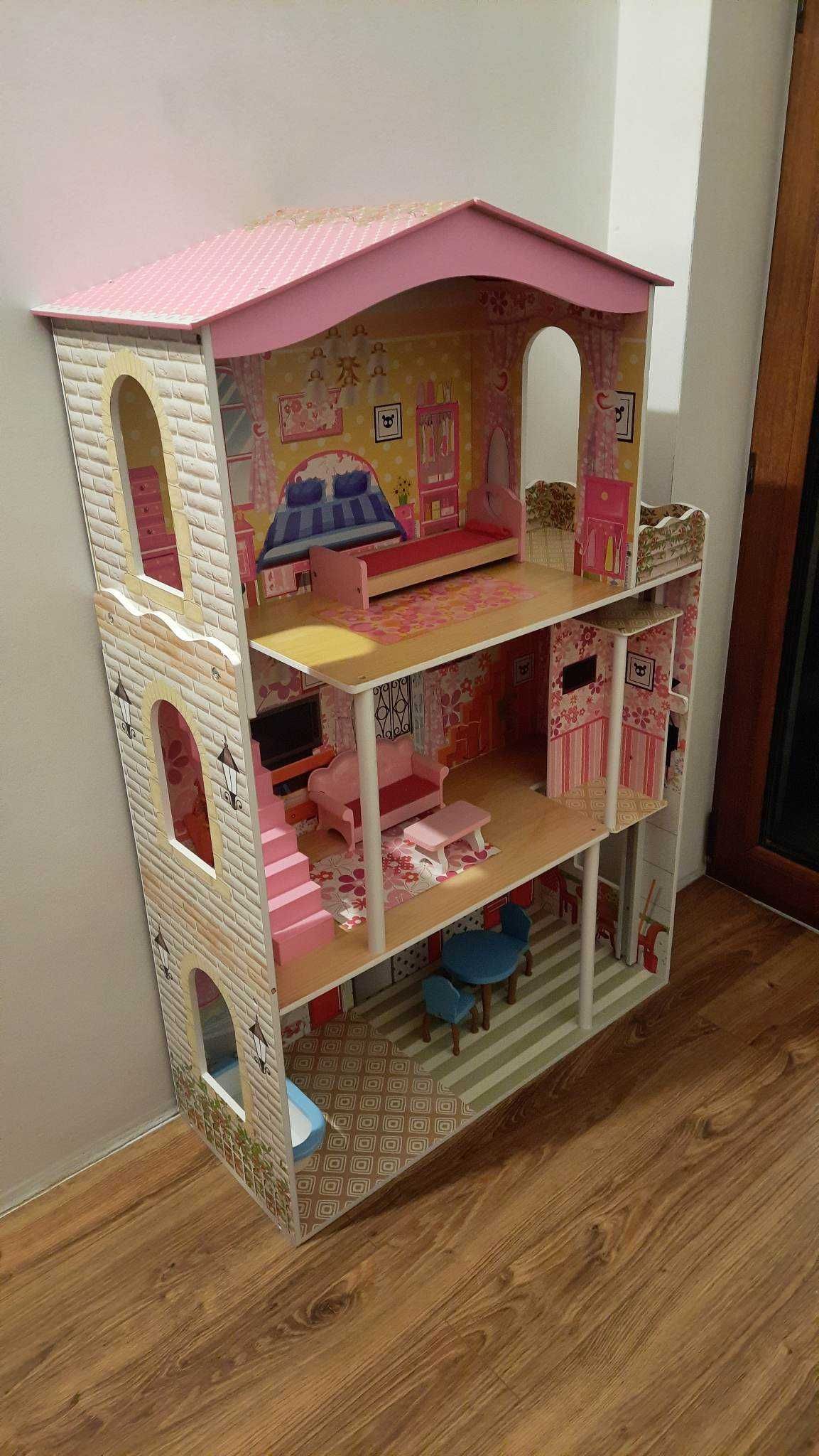Lalki Barbie, domek dla lalek i zestaw ubranek