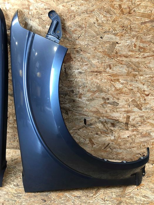 Błotnik przedni lewy prawy Pathfinder/Navara lift kolor b25