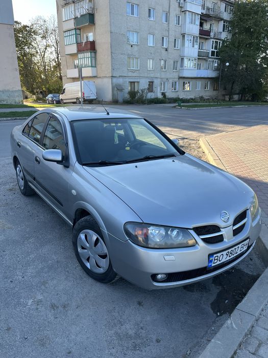 Сірий Nissan Almera 2006