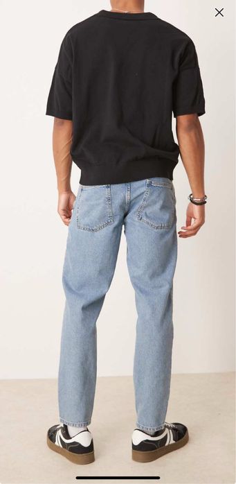 ASOS DESIGN tapered fit jeans in light wash blue