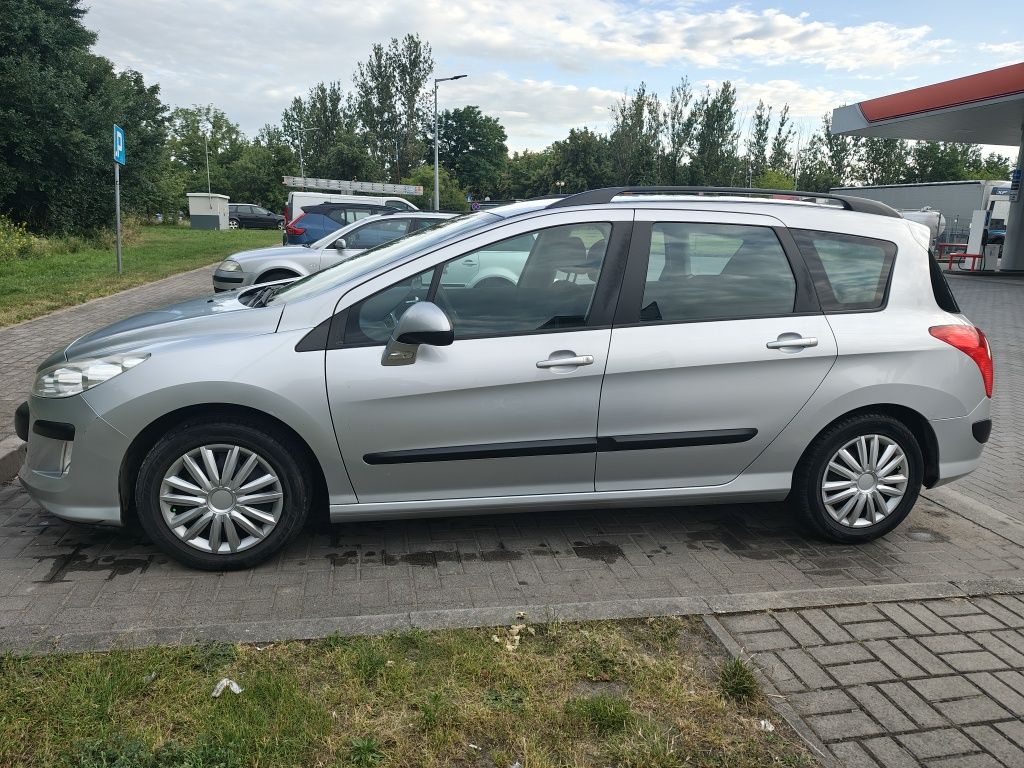 Peugeot 308SW 2009r. 1.4B 95KM 70kW