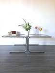 Mesa de centro cromada com vidro 70s. Chrome coffee table with glass