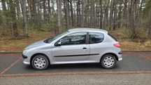 Peugeot 206 - rok 2005 (1,4 benzyna) - 175 tys. - wspomaganie, radio