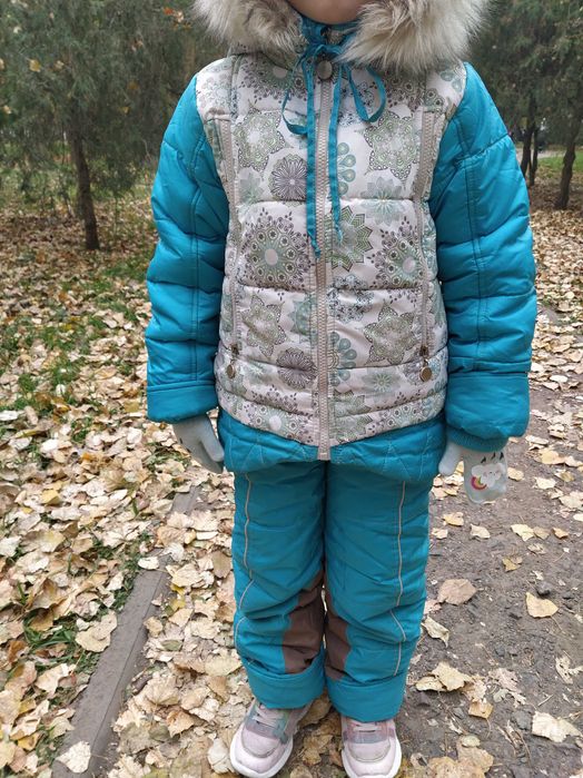 Кукла-пупс. Зимний фирменный комбинезон на девочку. Рост 110.