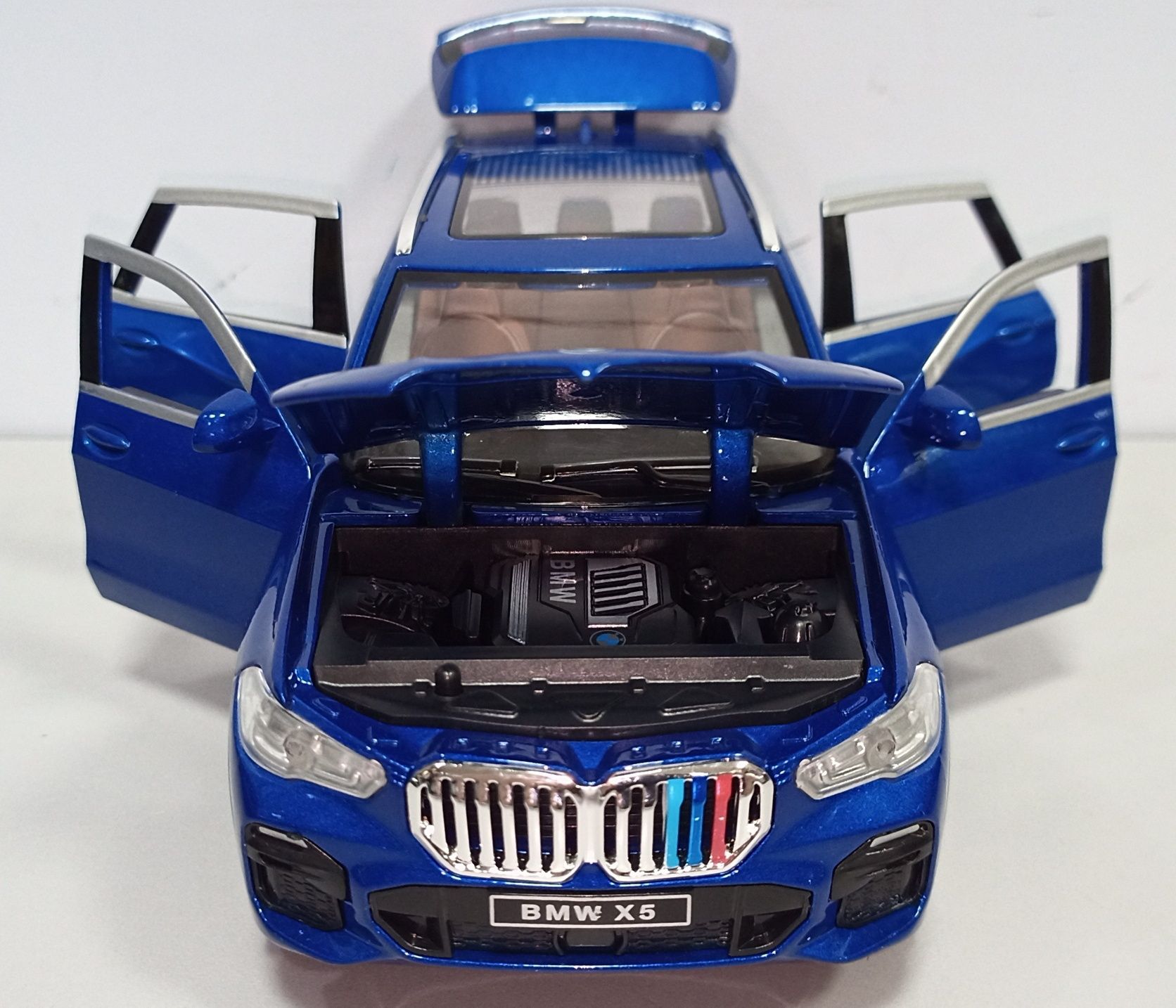 Машинка BMW X5 модель 1:24 NEWAO Toys. Металл, звук, свет.