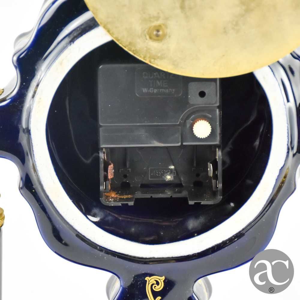 Relógio de lareira em porcelana Limoge e metal dourado