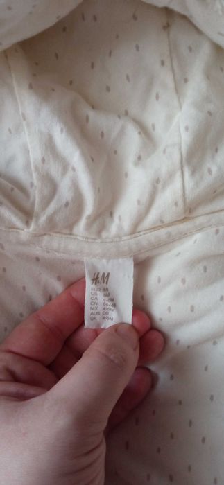 Kremowy futerkowy kombinezon H&M 68