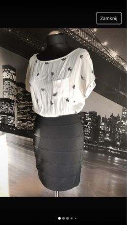 Elegancka czarno biala sukienka bandazowa ptaszki