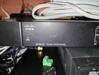 Cisco SF100‑16 – 16‑port Fast Ethernet switch, sprawny
