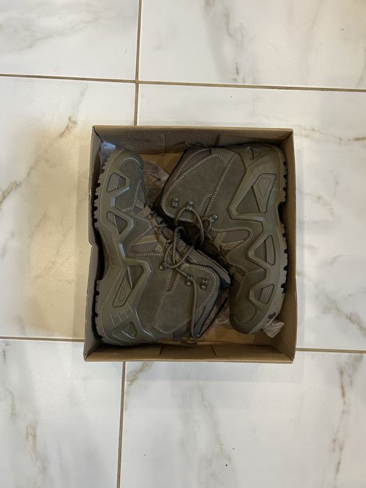 Продам нові черевикі олива