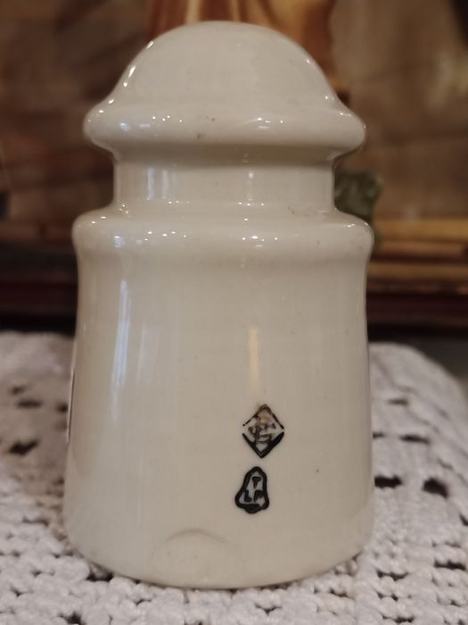 Isolador antigo em cerâmica vidrada da empresa TLP