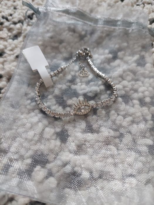 Pulseira prateada em aço nova