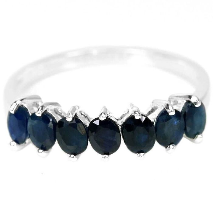 Серебряное кольцо "вечность" с синим сапфиром. Размер 19.25: