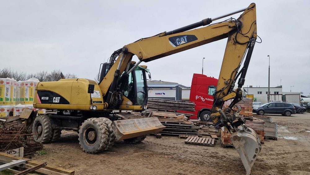 Koparka kołowa CAT 315 D