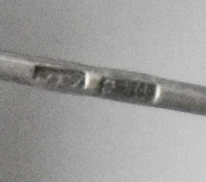 Srebrna ażurowa broszka